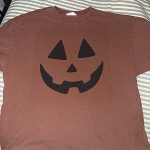 Halloween Pumpkin Face T-Shirt from Pink Lily worn once fits oversized